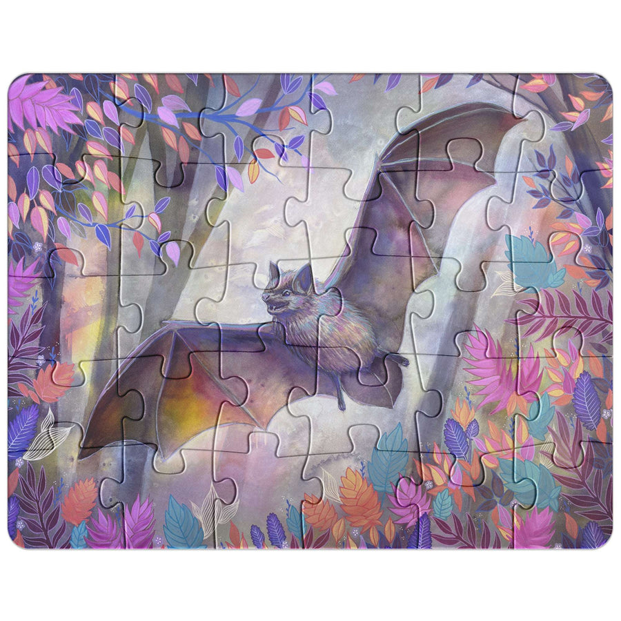 Assembled Bat Puzzle with a vibrant illustration of a bat flying among colorful, stylized leaves and flowers.