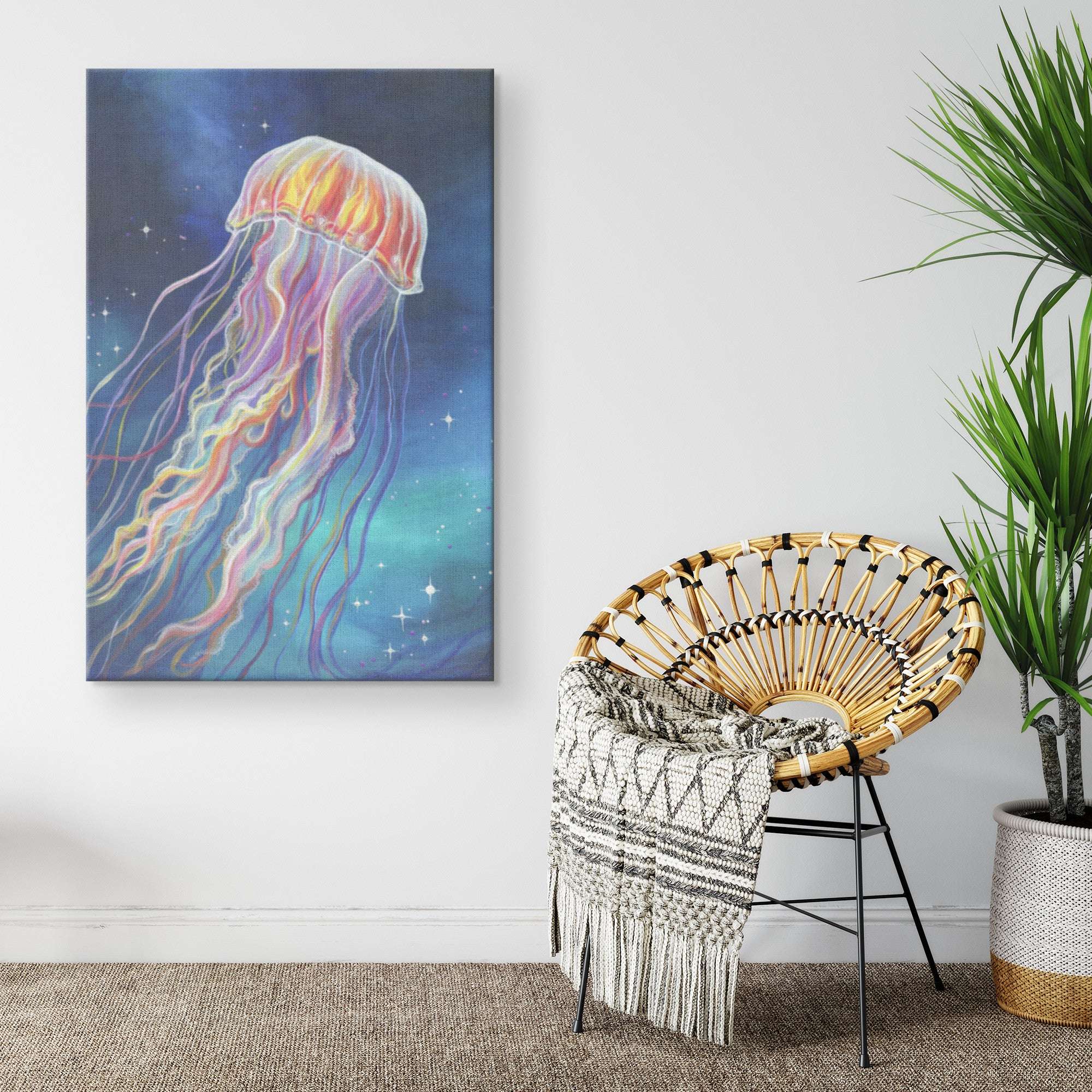 Art print of a Jellyfish Canvas Art Print on a canvas, hanging on a white wall next to a woven chair with a blanket, and a potted plant.