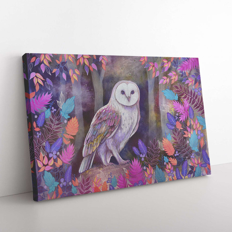 A Canvas Owl Art Print featuring an illustration of a white barn owl perched on a branch surrounded by colorful, vibrant leaves.