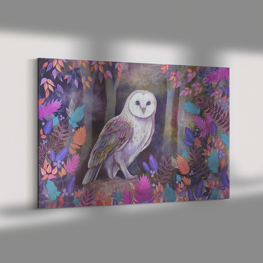 A vivid Canvas Owl Print of a white barn owl perched among colorful leaves, displayed on a gray wall.