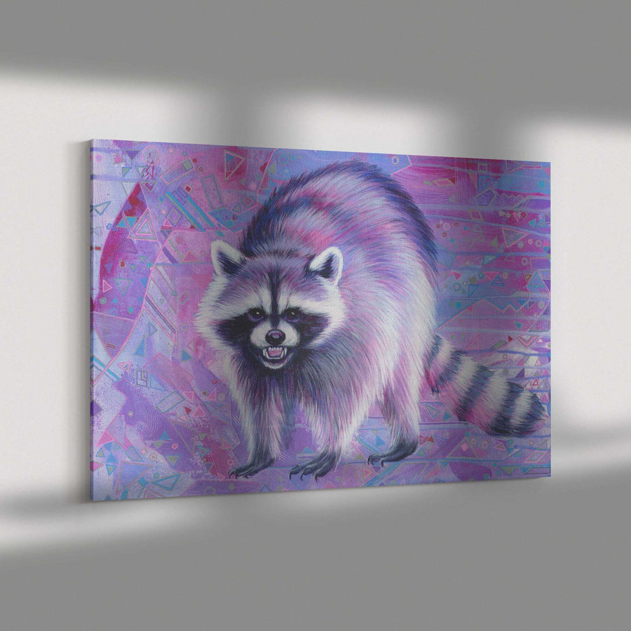 A vibrant Canvas Raccoon Print against a geometric patterned pink and purple background, displayed on a white wall with soft shadows.