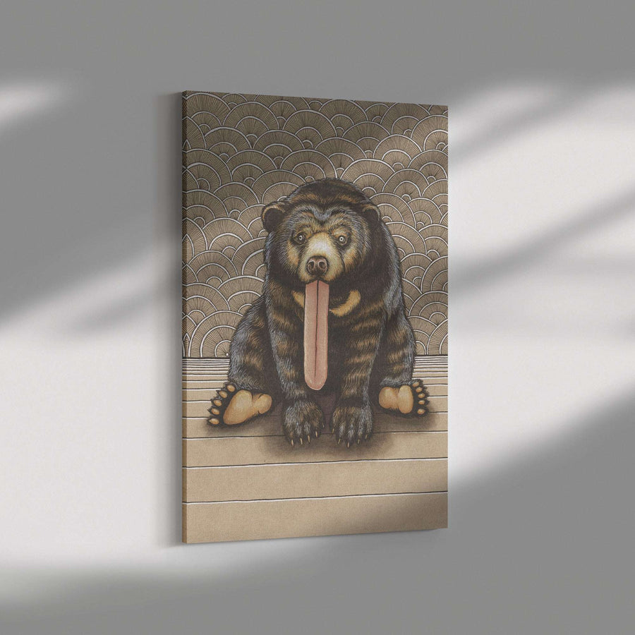 A Canvas Sun Bear Art Print featuring a stylized illustration of a bear with an elongated tongue, set against a patterned background, mounted on a gray wall.