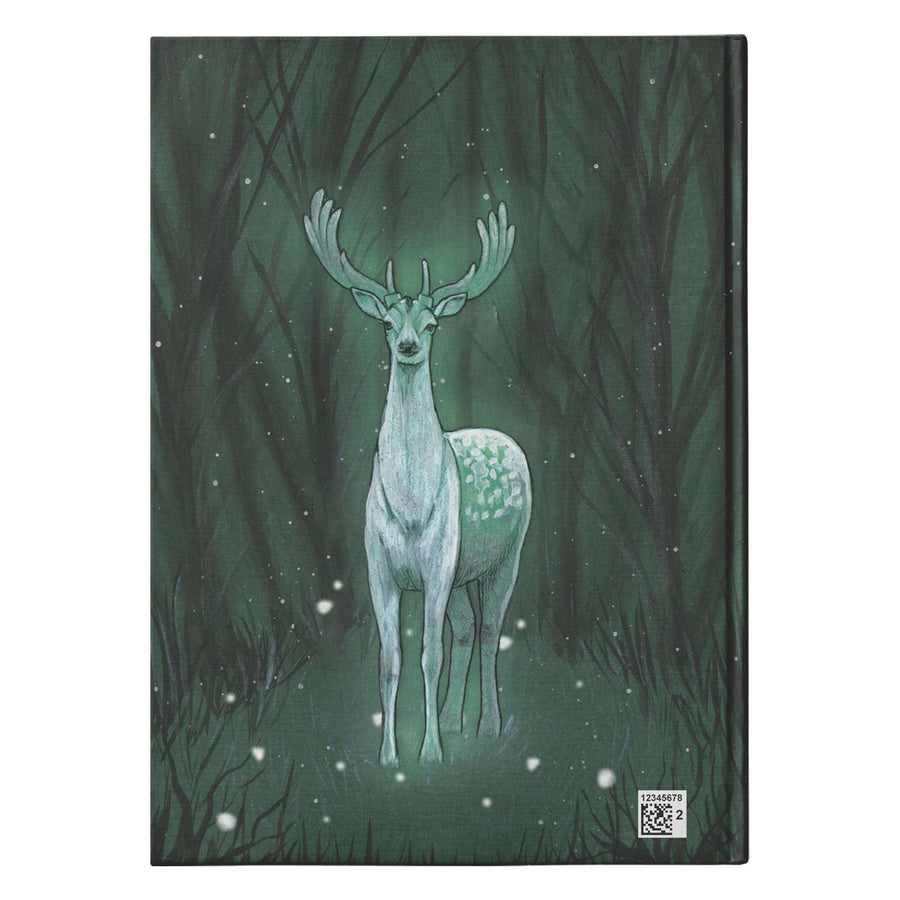 Back cover of an Enchanted Deer Journal showing a deer spirit standing in a dense, snowy forest at night.