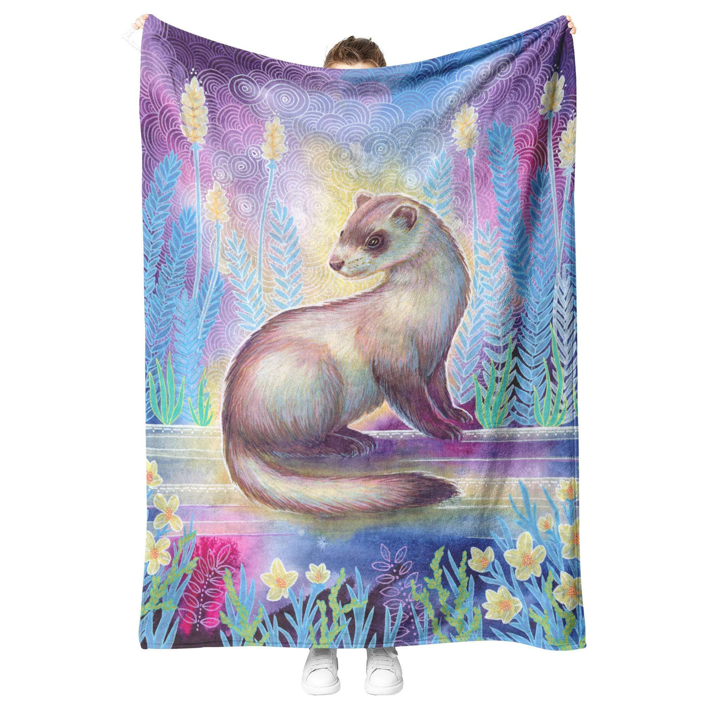 A person holding up a Ferret Blanket featuring a colorful illustration of a ferret surrounded by vibrant, stylized floral patterns.