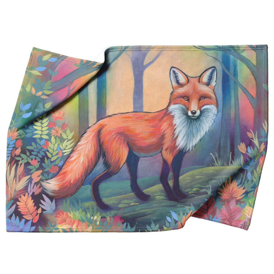 A colorful blanket featuring a detailed illustration of a Fox standing in a vibrant, wooded area with autumn foliage.