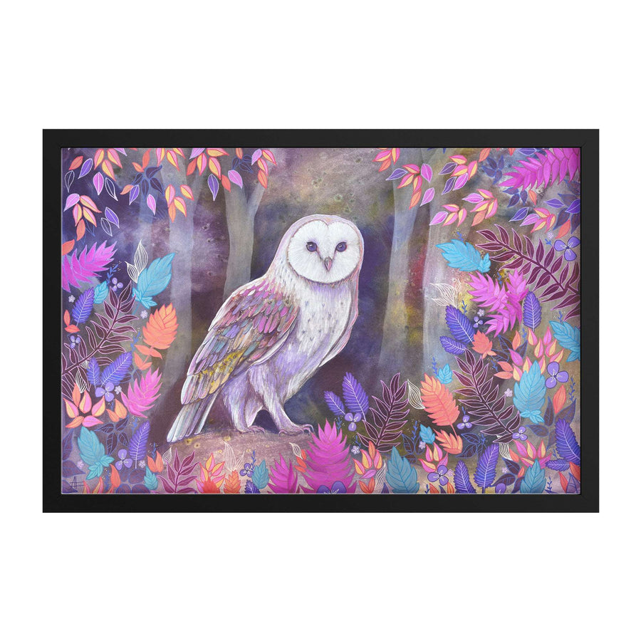 A Framed Owl Art Print of a white barn owl perched among colorful, stylized leaves and branches, framed in black.