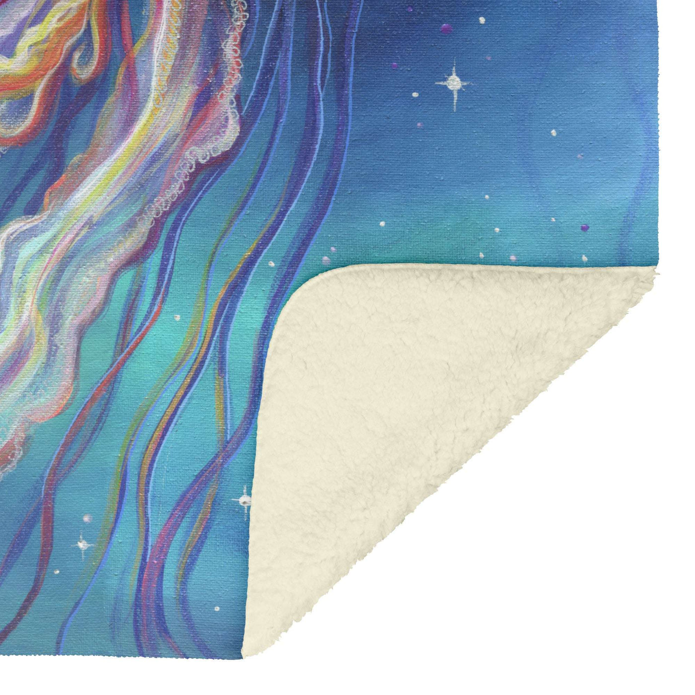 Sherpa blanket with a colorful jellyfish design against a starry sky background, the corner partially folded to show both sides