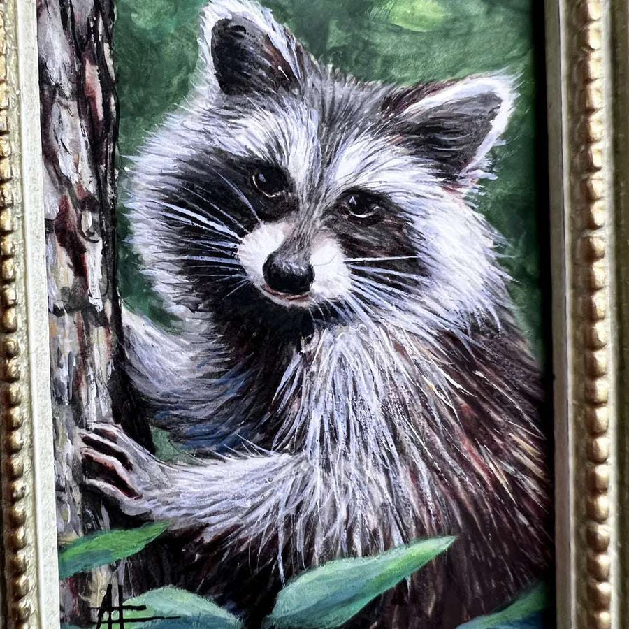 Zoomed-in view showing the textured details of a raccoon painting.