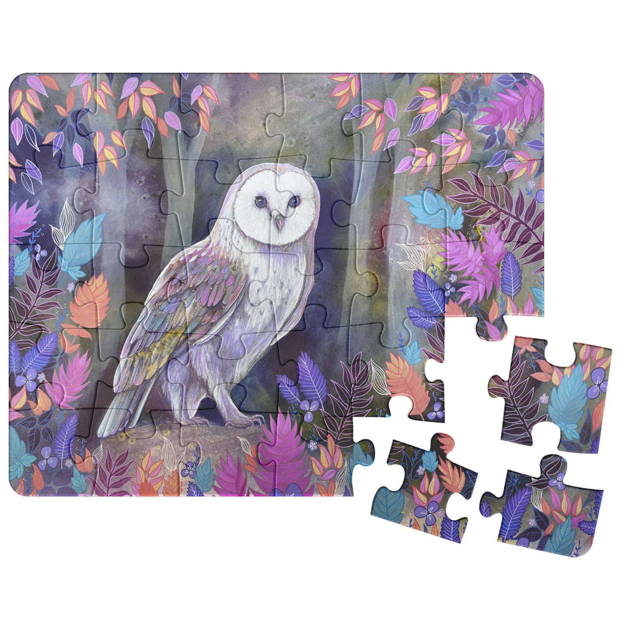 Owl Puzzle featuring a stylized white owl on a floral background with several pieces detached.