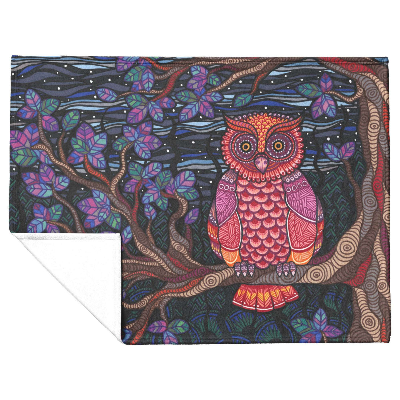 Colorful illustrated Owl Tree Blanket sitting on a branch against a night sky backdrop, depicted on a folded blanket with intricate patterns.