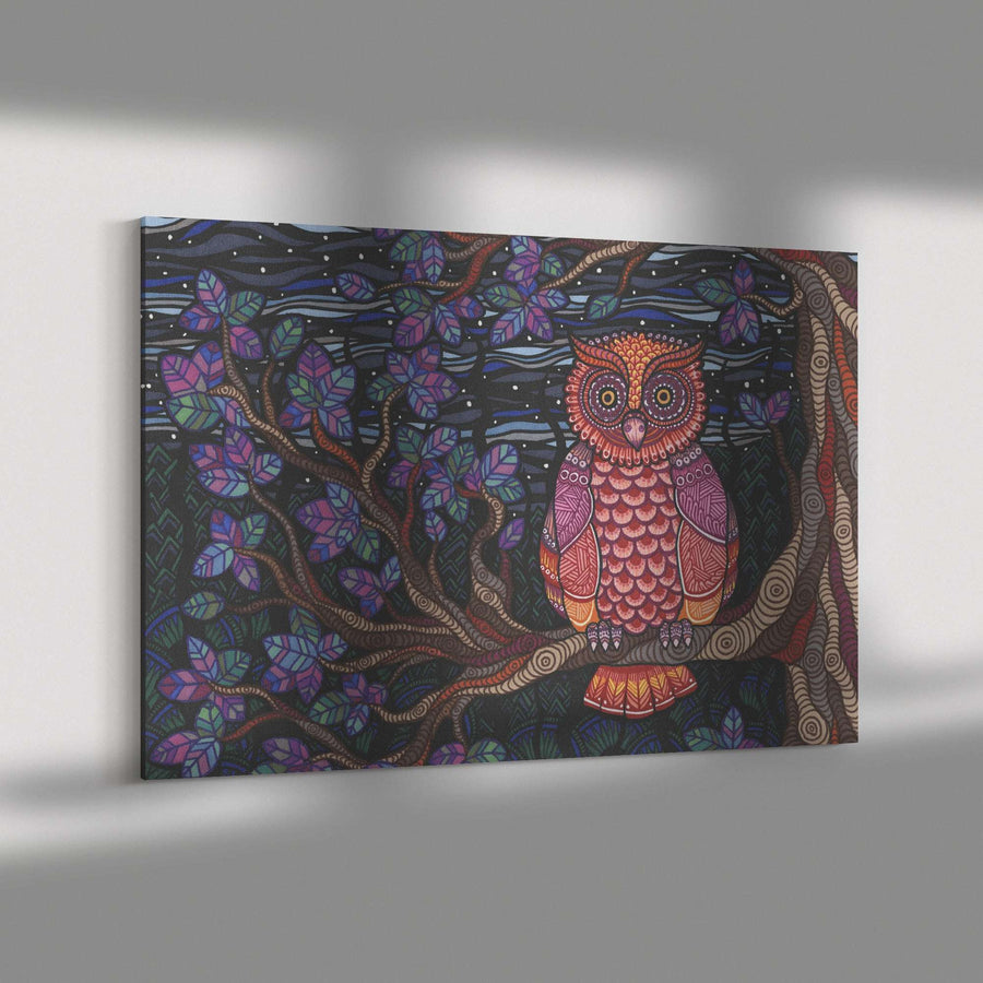 A colorful Owl Tree Canvas Print featuring a owl perched on a tree branch with intricate patterns, displayed on a wall, casting soft shadows.