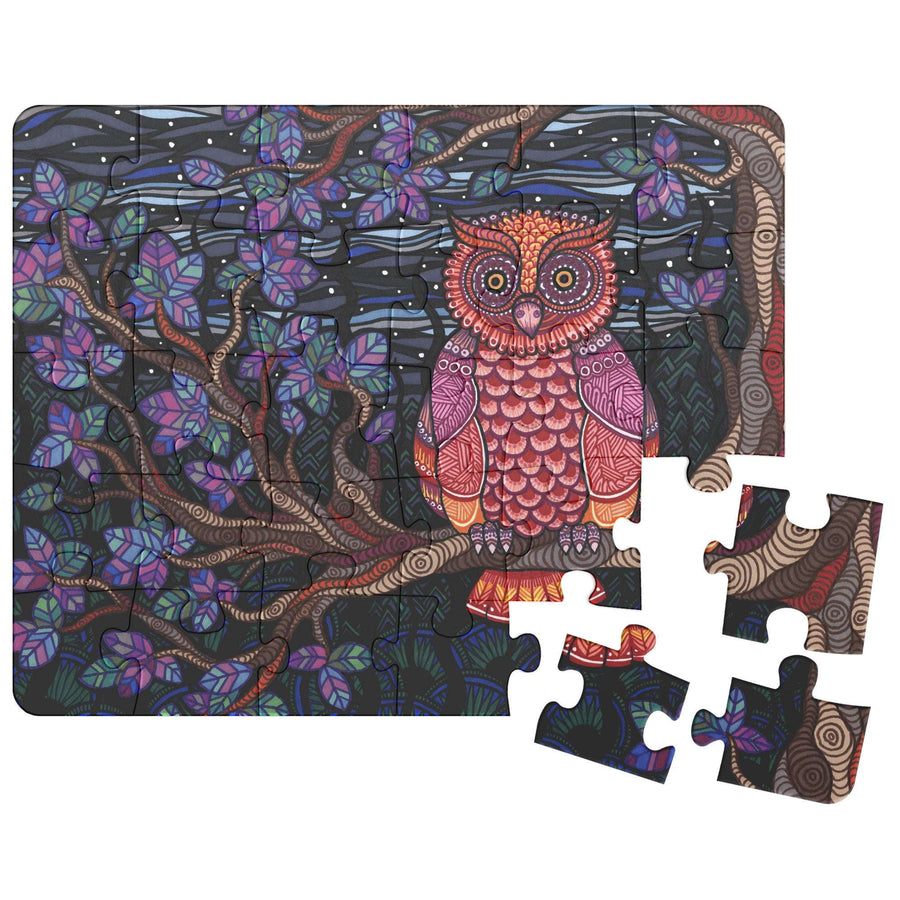 Illustrated Owl Tree Jigsaw Puzzle with a few puzzle pieces detached.