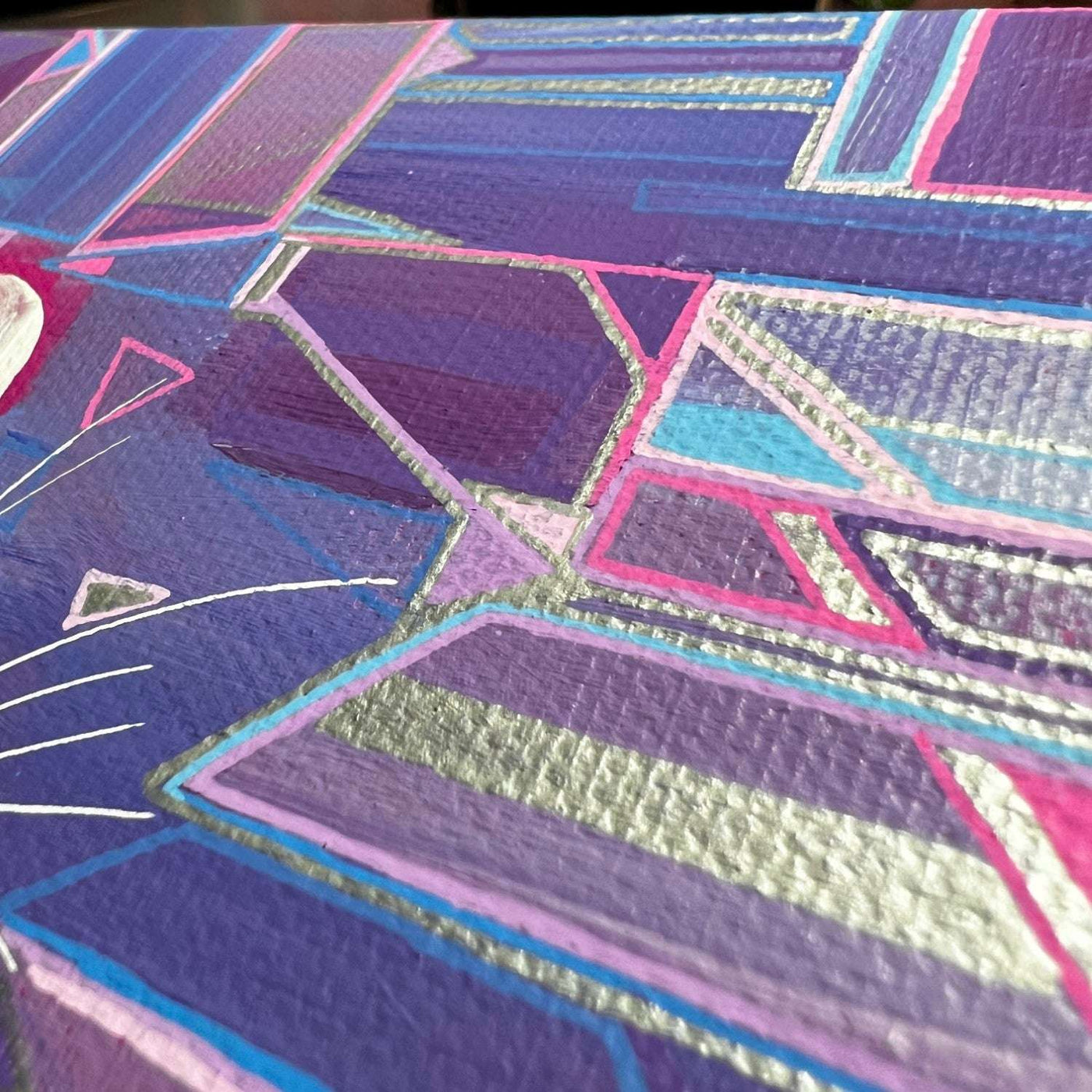 Close-up of rat original artwork featuring textured lines and geometric shapes in shades of purple, blue, and pink.