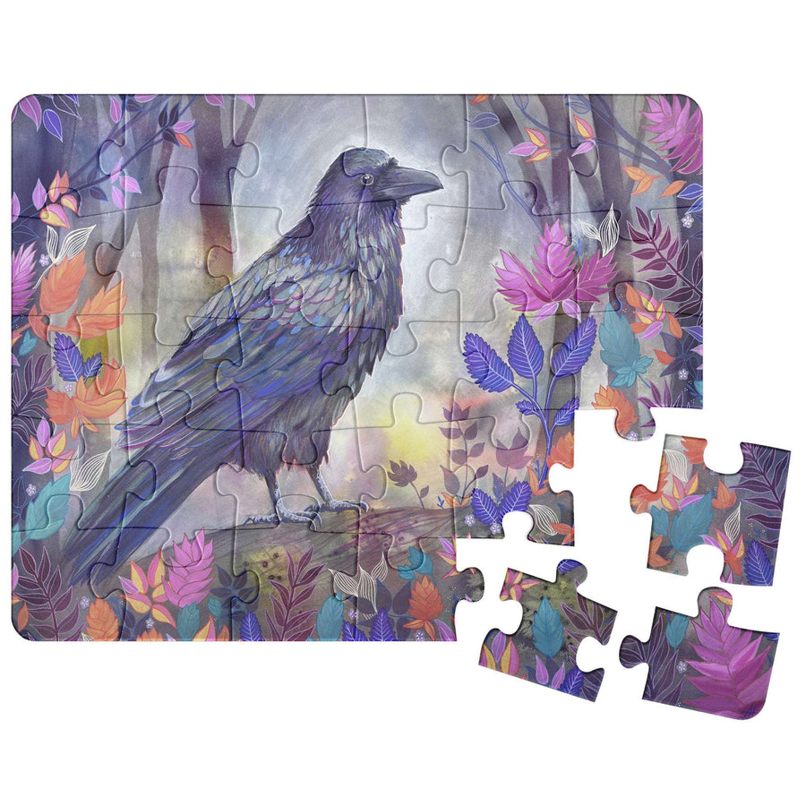 A Raven Puzzle depicting a raven amidst colorful leaves, partially assembled with a few pieces detached.