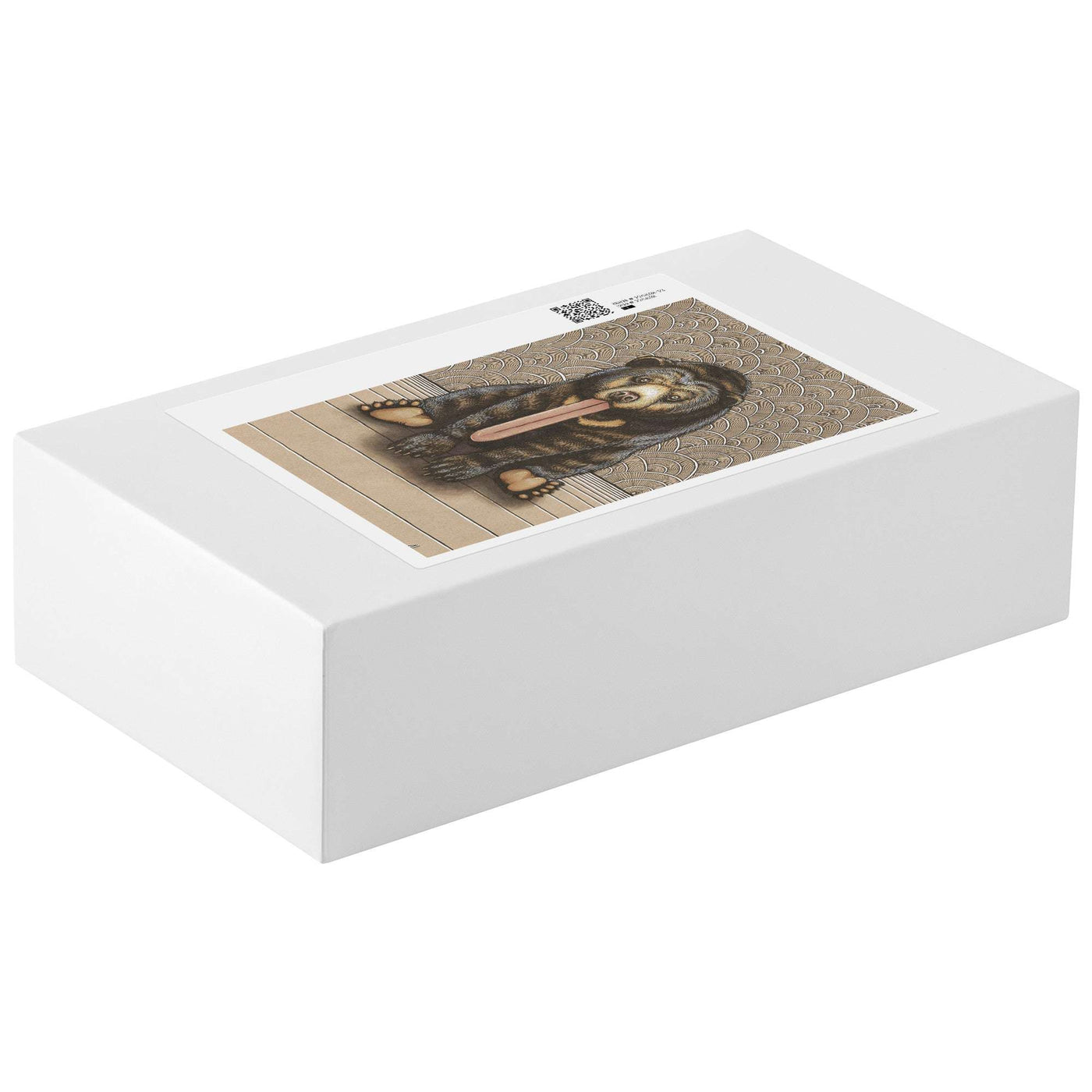 White rectangular puzzle box with a printed label on top showcasing a illustration of the completed Sun Bear Puzzle.