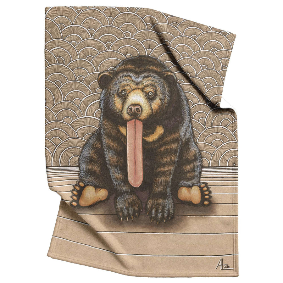 Illustration of a Sun Bear sitting with its tongue out, on a patterned blanket with a wave design, rendered in earthy tones.