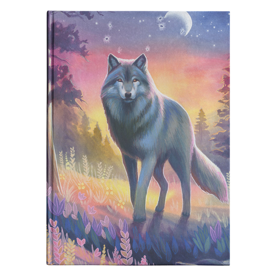 A Wolf Journal with an artistic cover depicting a wolf in a colorful forest under a twilight sky and crescent moon.