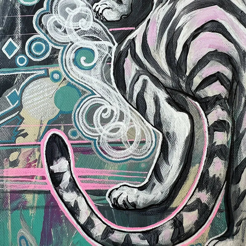 Close-up of a colorful graffiti mural featuring an abstract representation of a tiger with prominent stripes and swirling patterns against a vibrant backdrop Year of the Tiger Pair - Original Paintings.