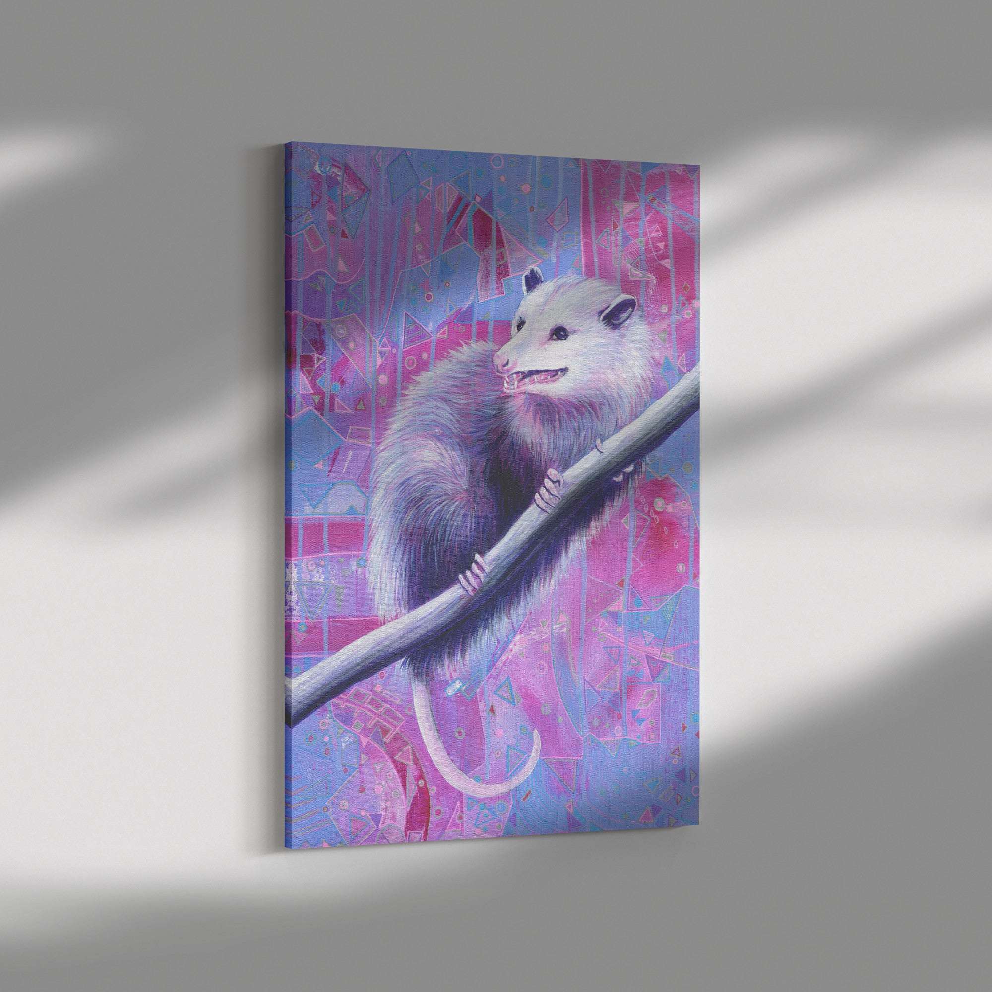 A vibrant opossum canvas print depicting an ethereal white opossum perched on a silver brush, set against a colorful, geometric background.