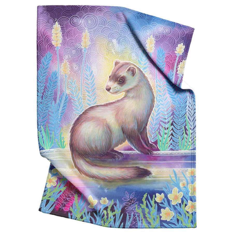 Colorful illustration of a ferret on a patterned Ferret Blanket featuring floral and swirling sky motifs.