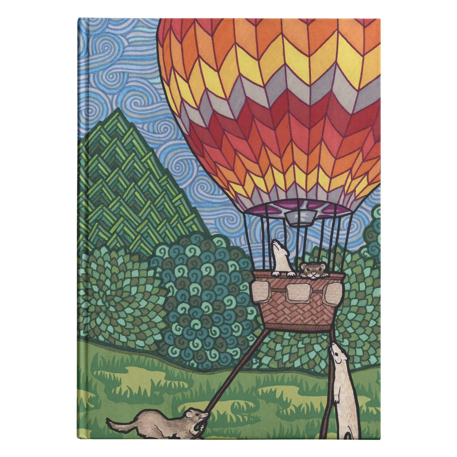 Illustration of a hot air balloon with swirl patterns floating above a scenic landscape, with ferrets in the basket, on the cover of the Ferret Flight Journal.