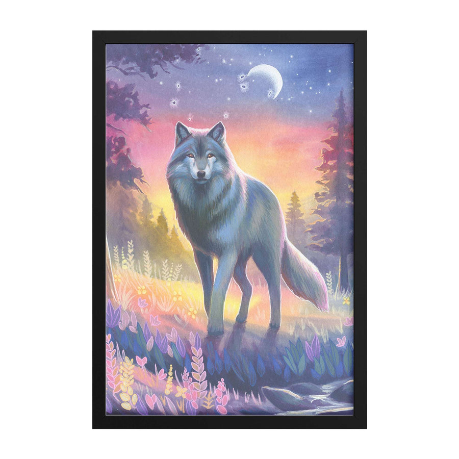 A Framed Wolf Art Print of a grey wolf standing in a colorful meadow under a twilight sky with crescent moon.