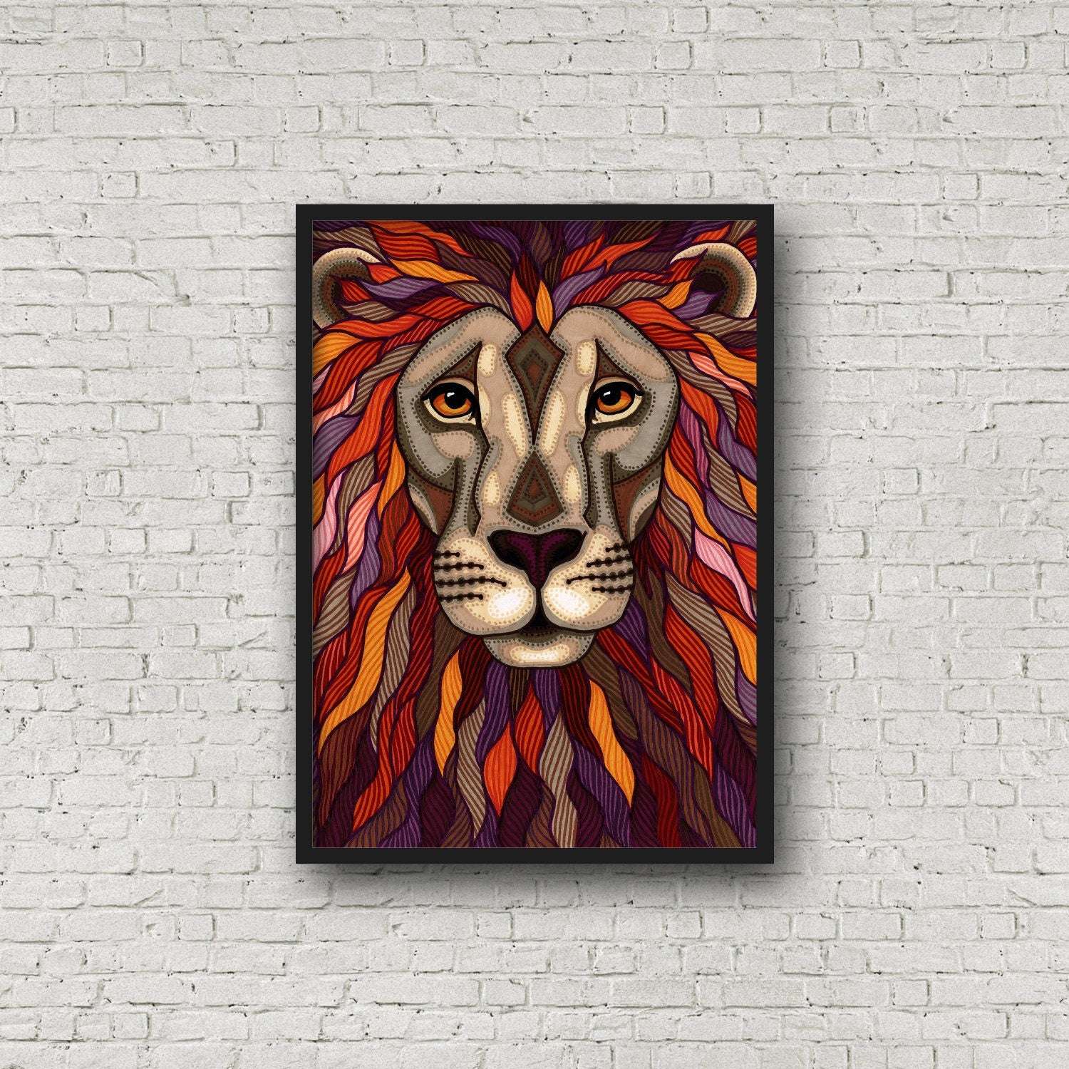 Framed lion portrait marker illustration art print on a brick wall.