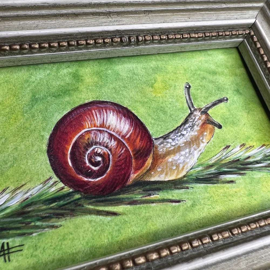 Close-up of the snail painting, highlighting the shell's spiral and the snail's textured body.