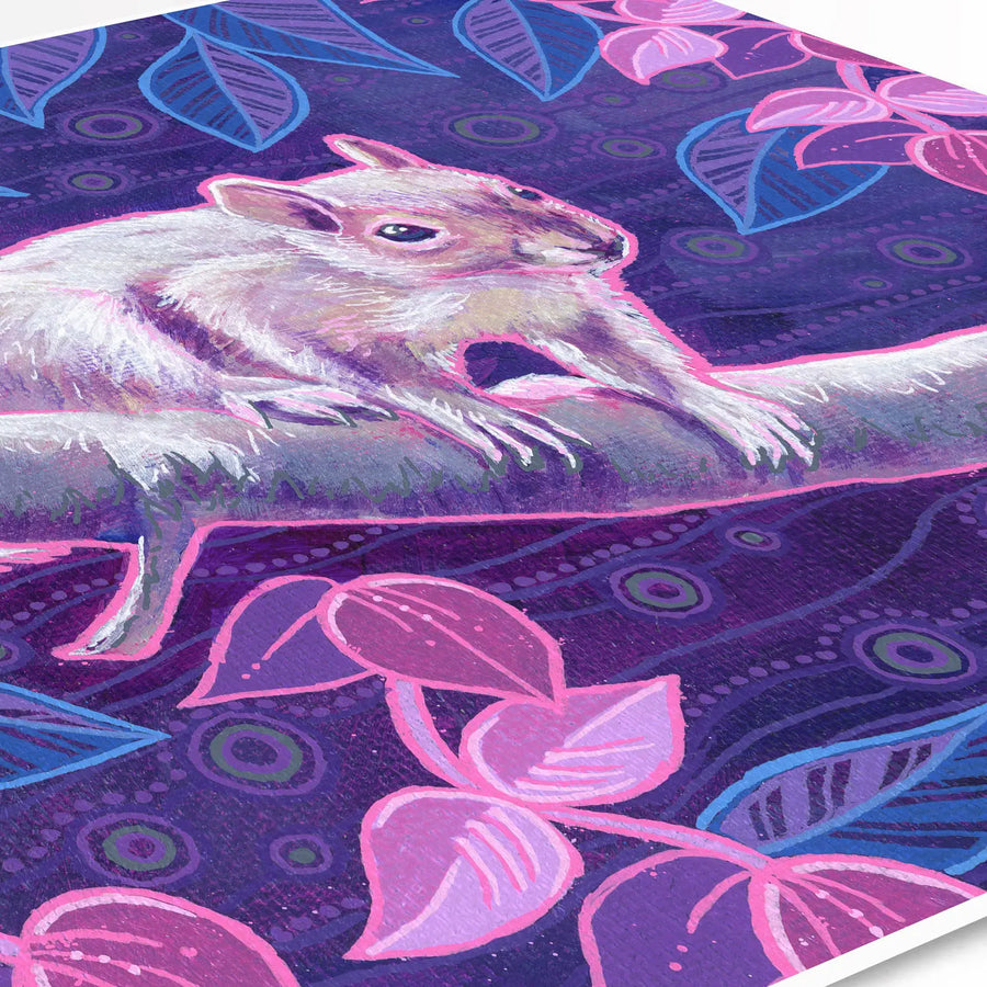 Angled Close Up of a vibrant art print of a squirrel on a branch, with pink foliage and a decorative purple background.
