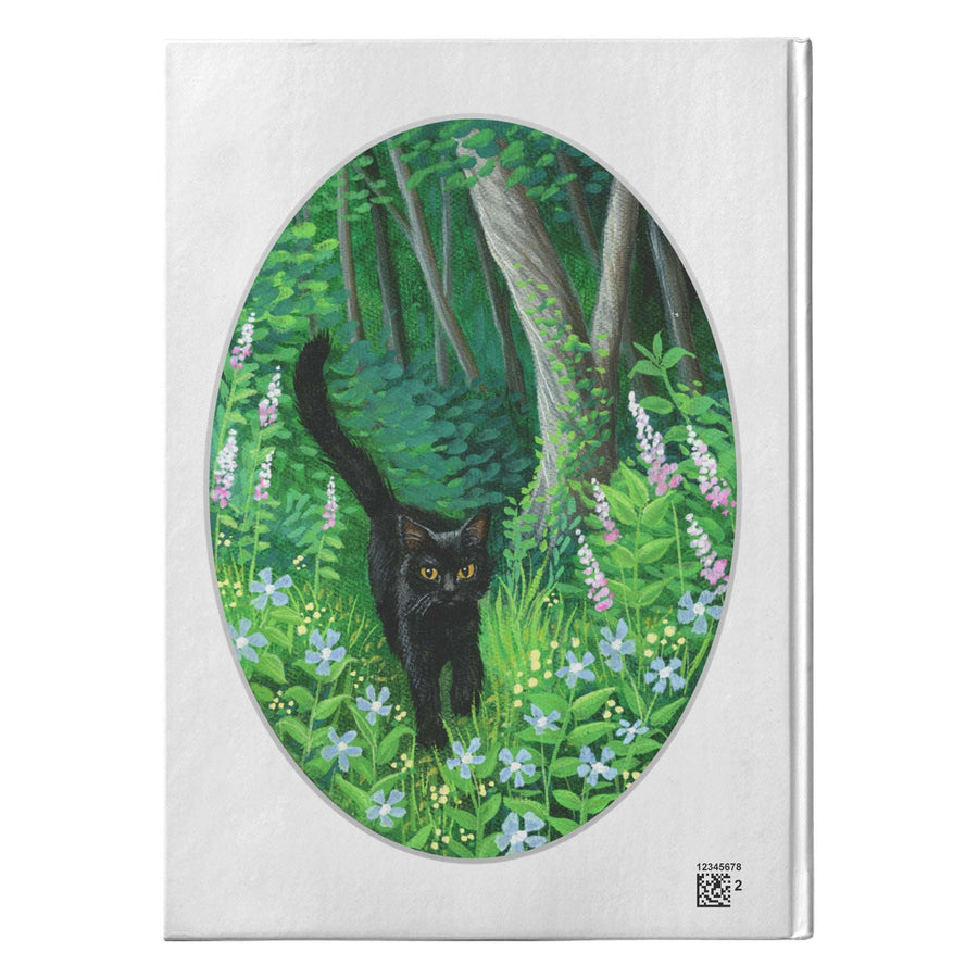 A Whiskered Welcome Journal featuring an illustration of a black cat walking through a lush green forest with blue and purple flowers.
