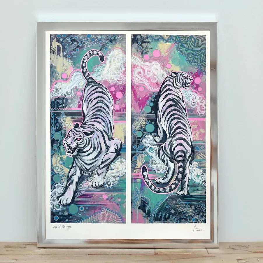 A Year of the Tiger Pair - Fine Art Print featuring two stylized white tigers on contrasting colorful abstract backgrounds, framed and displayed.